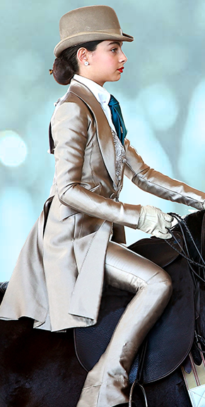 rider in custom creme suit
